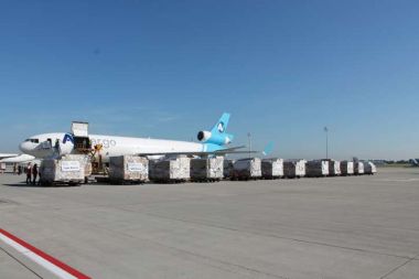 An emergency aid delivery of action medeor for those affected by the Ebola epidemic is loaded into the aircraft.