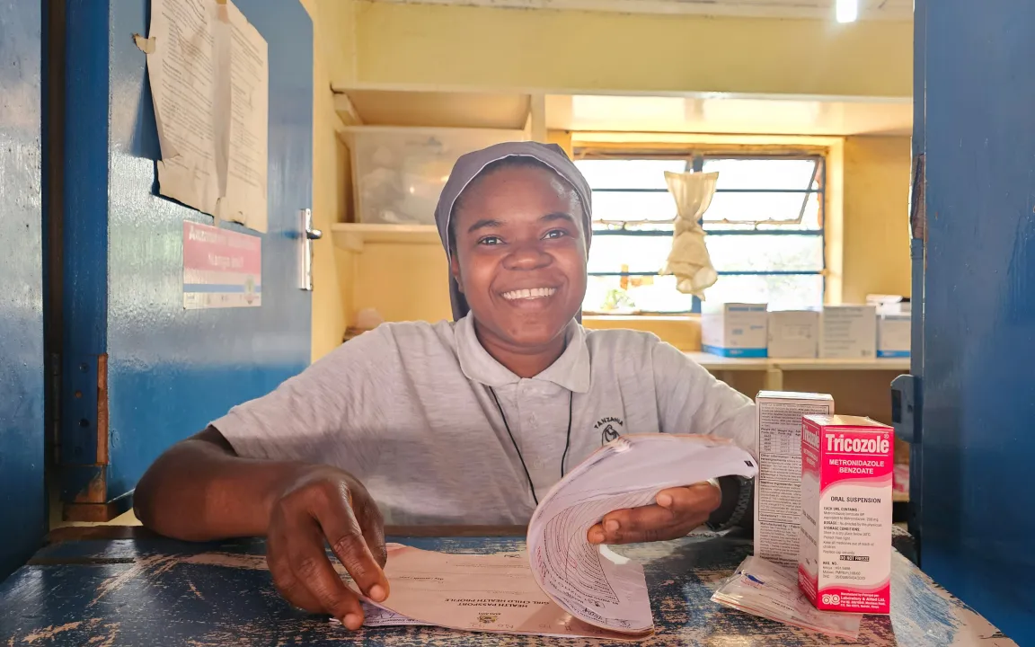A nurse at a medication dispensing unit.