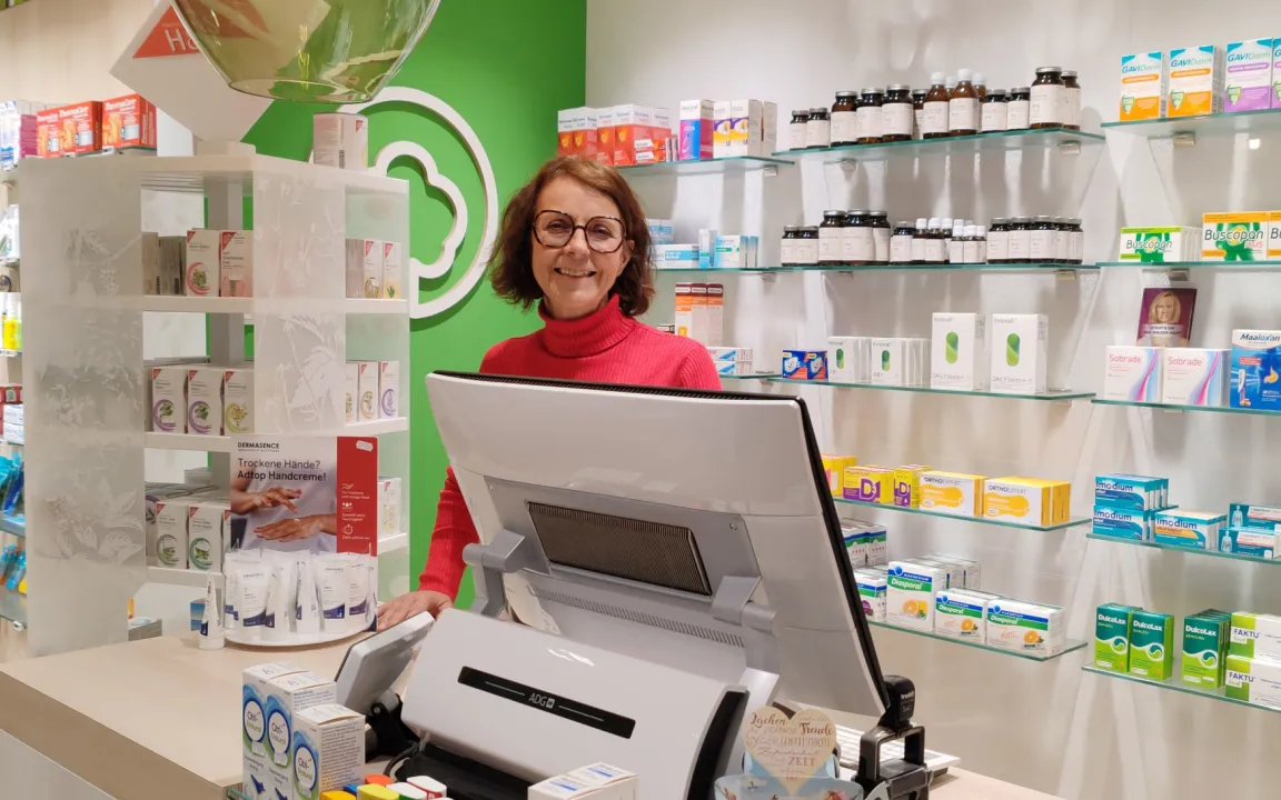 A woman in a pharmacy.